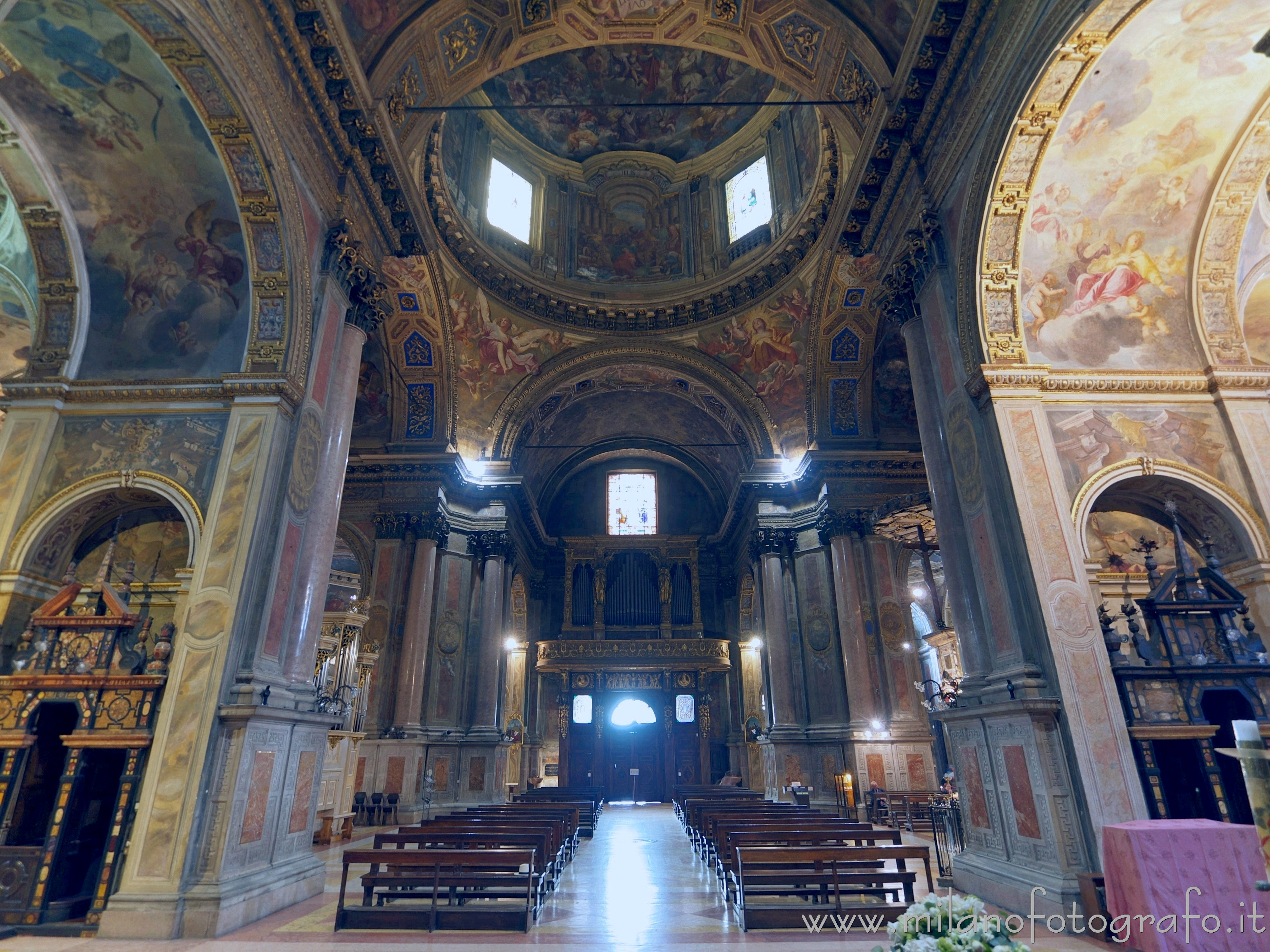 Milan (Italy) - Stone confessionals and central nave of  the Church of Sant'Alessandro in Zebedia